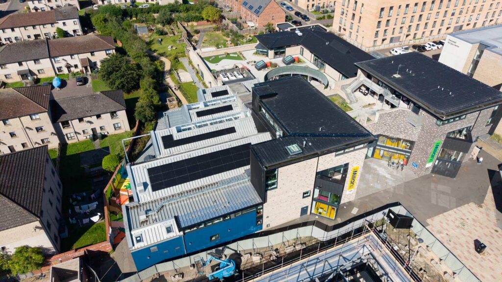 Aerial view of modern childcare centre beside housing