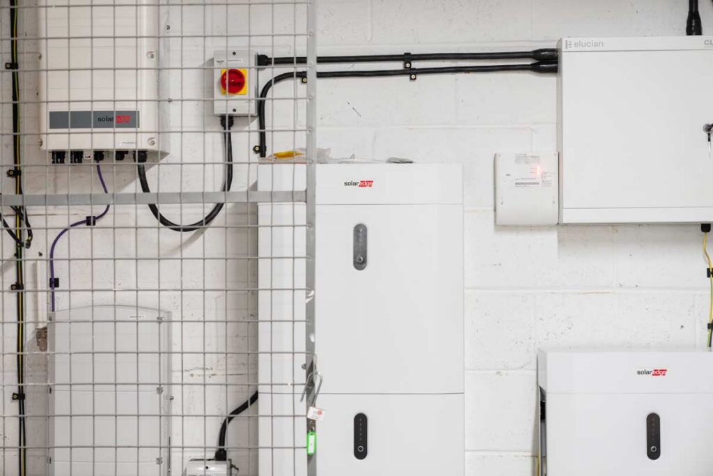 SolarEdge battery storage and electrical equipment on wall