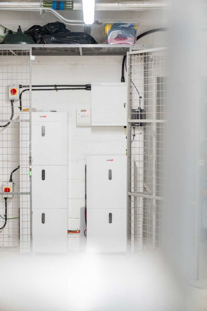 Battery storage units inside secured electrical equipment enclosure