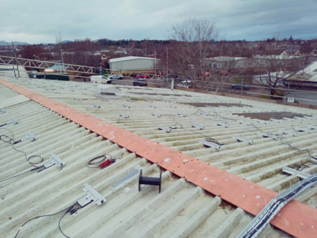 Industrial rooftop with cable trays and mounting brackets